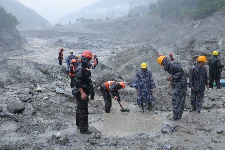 Nepal Flood Latest News: Death Toll Passes 900 as Rescue Efforts Continue Nepal flood rescue workers clearing debris after August 2026 flash floods